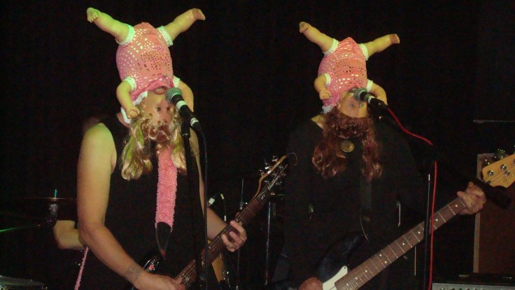 doll heads by ollie tarboschski